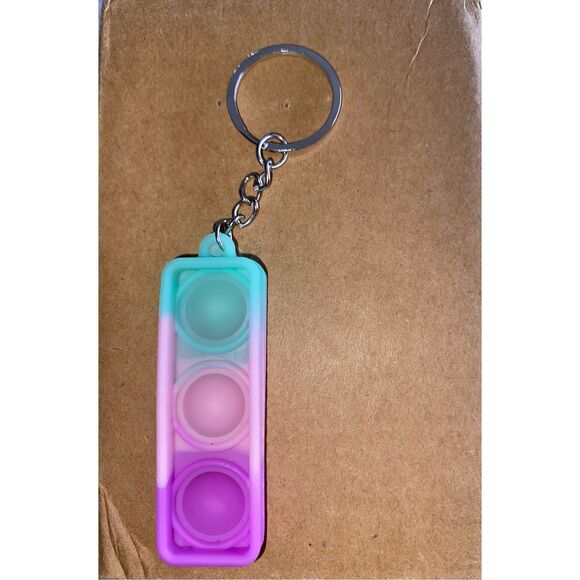 ☀️3/$12☀️ Letter “I” Pop Fidget Toy Keychain - Picture 1 of 3